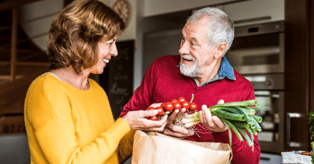 a senior couple with food