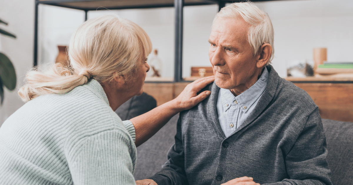 a senior couple having a conversation