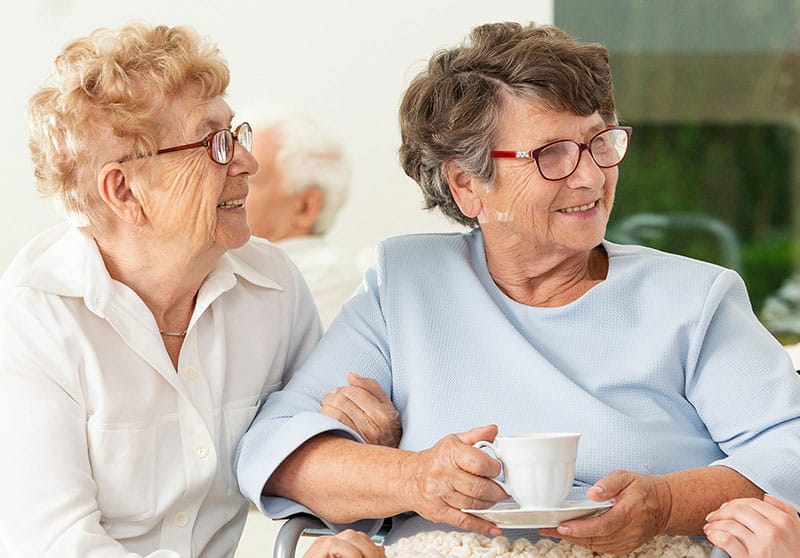 Senior ladies enjoying a cup of coffee